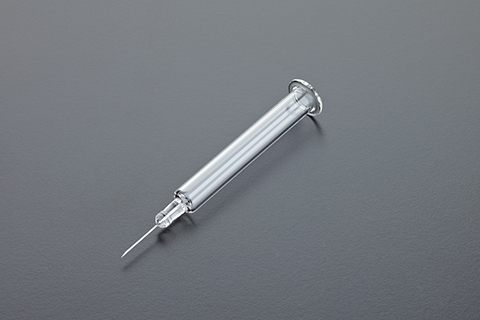 Pre-filled glass syringe